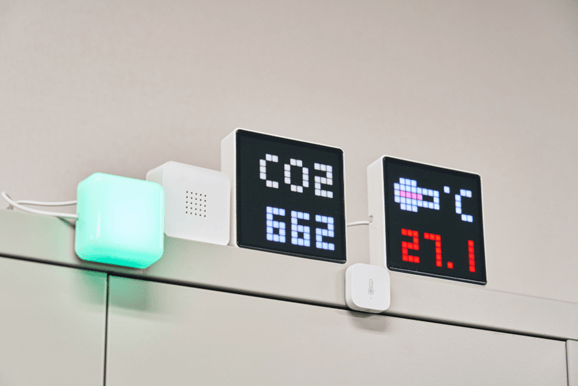 Temperature and humidity sensor installed in a room